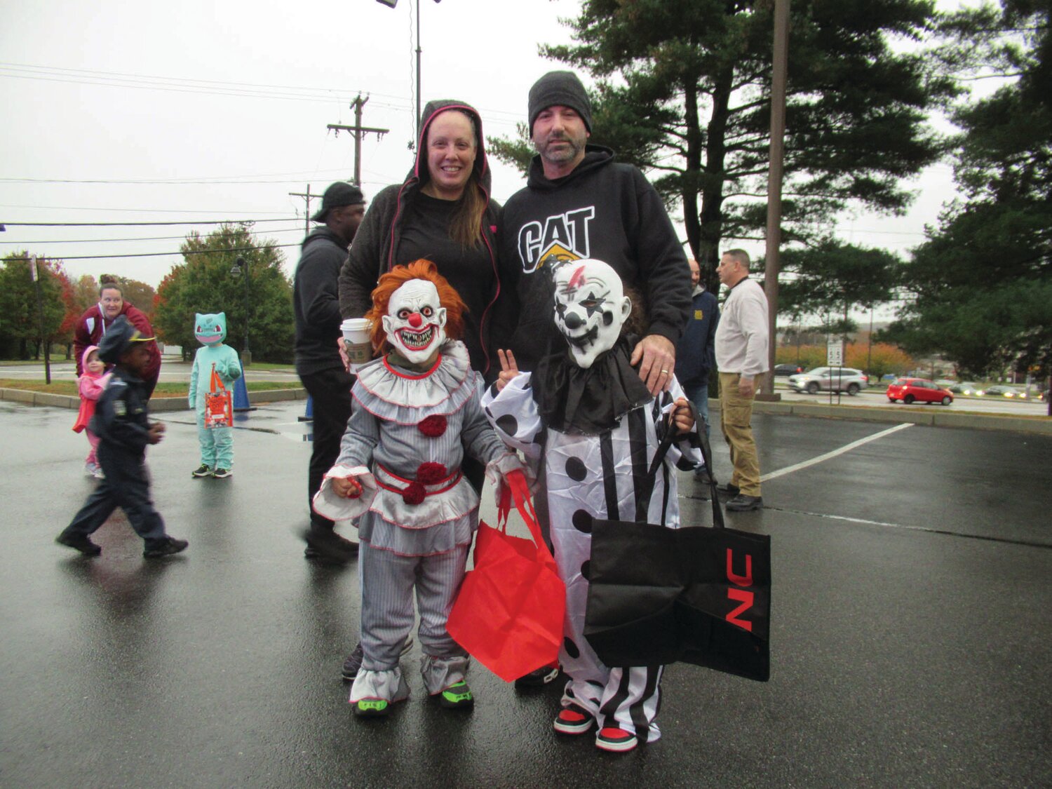 SPOOKY SORTS: Heather and Joe Bannon are among the many grandparents who brought their grandchildren Giod and Llijah Manuppelli-Mirabella to the JPD’s 3rd Annual Turn or Treat.